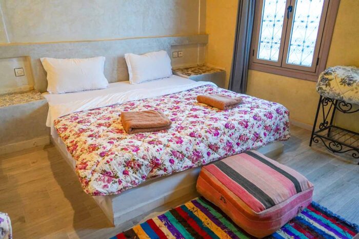 Beautiful Moroccan-style Double Room with warm lighting and desert views